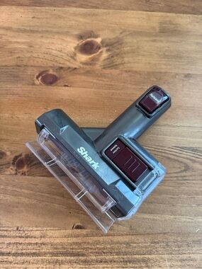 Shark Mini Motorized Brush accessory in charcoal gray